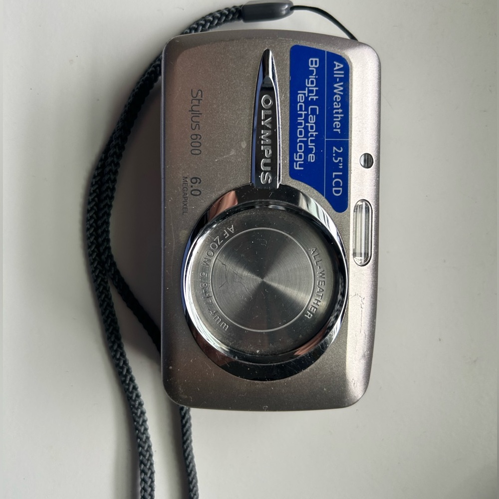 Olympus Stylus 600 6.0MP All Weather 3x Optical Zoom Digital Camera -Silver READ